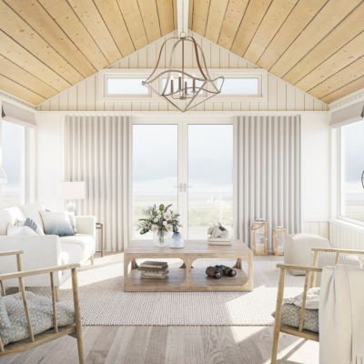 Cream, floor-length curtains over glass doors