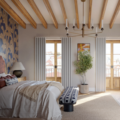 Grey wave curtains over small patio doors that open onto Juliet balconies